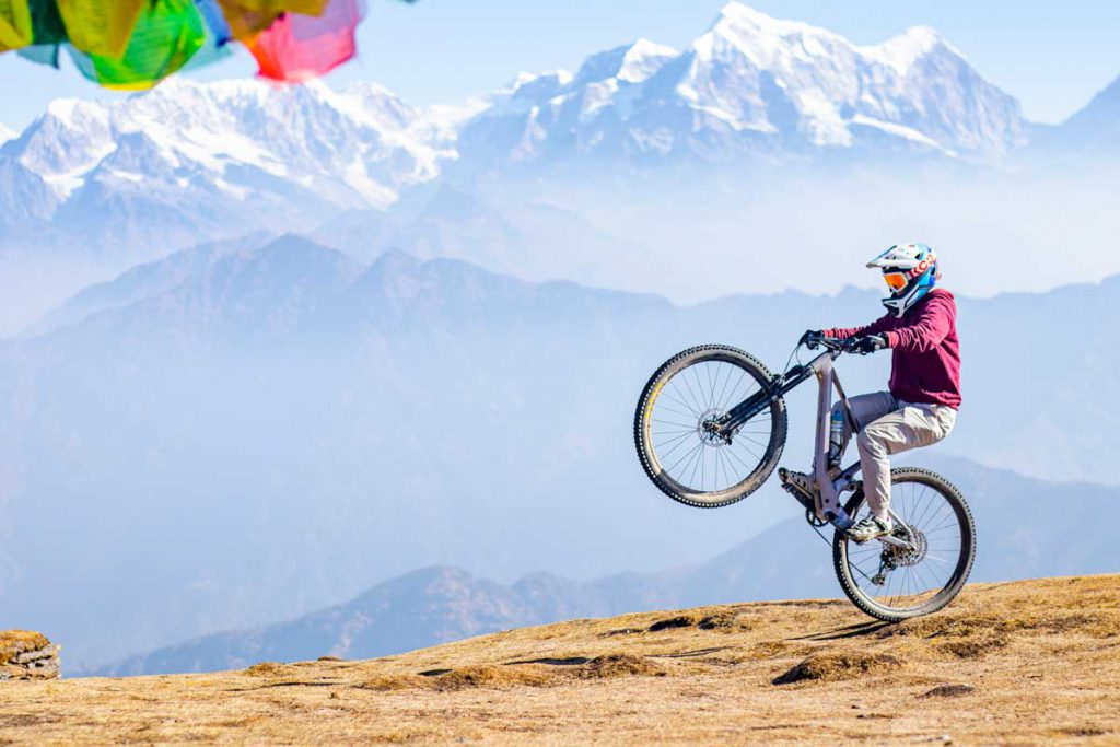 Riding Mountain Bike at The Top of Pikey Peak, Himalayan Action