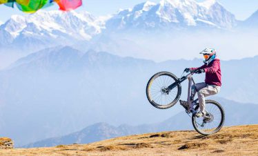 Riding Mountain Bike at The Top of Pikey Peak, Himalayan Action