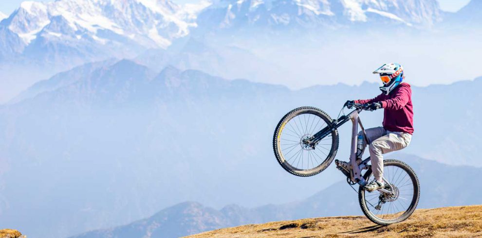 Riding Mountain Bike at The Top of Pikey Peak, Himalayan Action